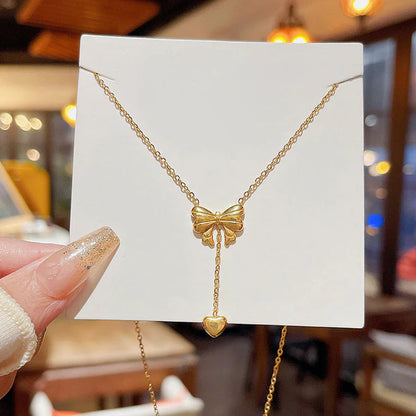 "Heart Themed Bow inspired Pendant" Necklace- 18K Premium Gold Plated